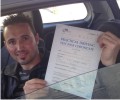 Shkelzen with Driving test pass certificate